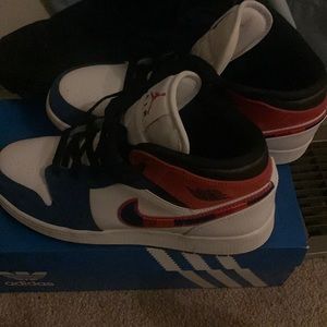 Jordan 1’s with orange /red / purple accent